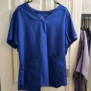 Gently Worn MedCouture Scrub Top in Galaxy Blue